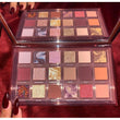 Load image into Gallery viewer, Huda beauty naughty nude eyeshadow palette