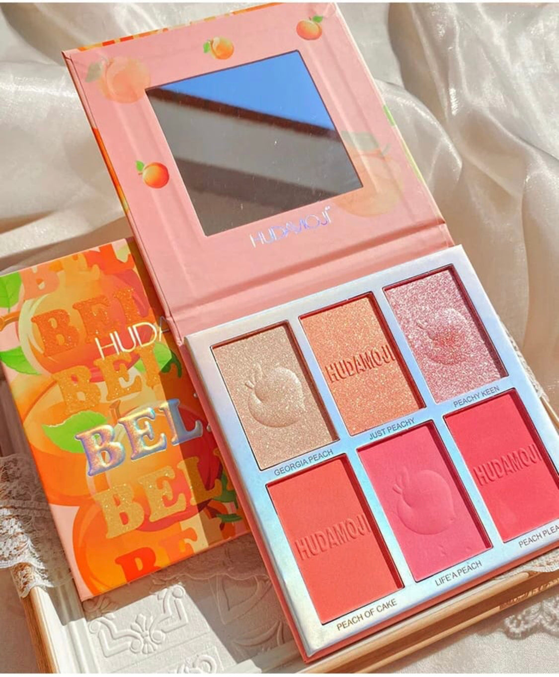 Huda bellini blush and highlighter palette